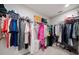 Organize your wardrobe with ease in this spacious walk-in closet with ample storage and shelving at 11719 Tetrafin Dr, Riverview, FL 33579