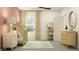 Charming Bedroom with a cute crib, stylish dresser, and decorative wall mirror at 11836 Blue Diamond Trl, Parrish, FL 34219