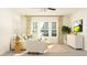 Bright living room with neutral tones, a large sofa, and natural light at 11836 Blue Diamond Trl, Parrish, FL 34219