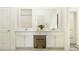 Bright bathroom vanity area features double sinks and ample storage space at 12313 Precious Ruby Way, Parrish, FL 34219