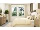 Relaxing bedroom space with neutral color palette, and beautiful bright windows at 12313 Precious Ruby Way, Parrish, FL 34219
