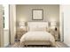 Cozy bedroom with neutral decor, soft lighting, stylish lamps and a patterned rug at 12313 Precious Ruby Way, Parrish, FL 34219