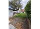 The backyard, showing a shed and trailer in the background at 12502 Cambridge Ave, Tampa, FL 33624