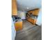 Functional kitchen boasts wood cabinets, granite countertops, and modern stainless steel appliances at 12502 Cambridge Ave, Tampa, FL 33624