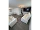 Modern living room with sleek leather sofas, contemporary decor, and stylish lighting at 12502 Cambridge Ave, Tampa, FL 33624