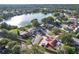 An aerial view of homes surrounding a scenic lake at 12529 Mondragon Dr, Tampa, FL 33625