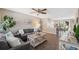 Cozy living room featuring stylish furniture, modern decor, and ample natural light at 12529 Mondragon Dr, Tampa, FL 33625