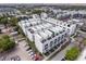 Contemporary townhouse community with rooftop terraces, parking, and modern architectural design at 1330 W Gray St # 2, Tampa, FL 33606