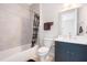Chic bathroom with contemporary finishes, a tub-shower combo, and a stylish vanity for a fresh, modern feel at 1330 W Gray St # 2, Tampa, FL 33606
