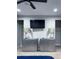 Well appointed bedroom featuring a large television, ambient lighting, and walk in closet access at 1330 W Gray St # 2, Tampa, FL 33606