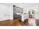 Modern kitchen with gray cabinets, stainless steel appliances, pendant lighting, and breakfast bar seating at 1330 W Gray St # 2, Tampa, FL 33606