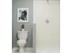 Bathroom featuring a toilet, shower, and modern design at 13510 White Gold Run, Parrish, FL 34219