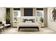 Stylish bedroom featuring a king-size bed, nightstands, and modern decor at 13510 White Gold Run, Parrish, FL 34219