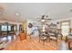 Charming dining area with wood floors and direct access to the kitchen at 1417 Langley Dr, Sun City Center, FL 33573