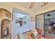 Bright, connecting breakfast nook with white cabinets and appliances is a sunny and inviting space at 1417 Langley Dr, Sun City Center, FL 33573