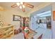 Bright breakfast nook with charming decor adjacent to the kitchen area at 1417 Langley Dr, Sun City Center, FL 33573