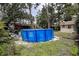 Backyard featuring an above ground pool at 1726 Massachusetts Ne Ave, St Petersburg, FL 33703