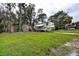 Exterior view of a house with an RV at 1726 Massachusetts Ne Ave, St Petersburg, FL 33703