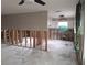 Renovated kitchen showing a work in progress with exposed framing and updated cabinetry at 1726 Massachusetts Ne Ave, St Petersburg, FL 33703