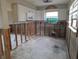 Renovated kitchen showing a work in progress with exposed framing and updated cabinetry at 1726 Massachusetts Ne Ave, St Petersburg, FL 33703