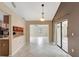 Bright dining area showcasing tile flooring and an open layout leading to adjacent rooms at 1808 Sawhorse Ct, Lutz, FL 33559