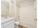 Well-maintained bathroom featuring a white tub, shower, toilet, and vanity at 18533 Bridle Club Dr # 18533, Tampa, FL 33647