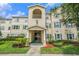 Exterior view of a multi-story building with well-maintained landscaping and architectural details at 18533 Bridle Club Dr # 18533, Tampa, FL 33647