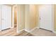 Bright condo foyer featuring a stylish wood-look flooring and a neutral color palette at 18533 Bridle Club Dr # 18533, Tampa, FL 33647