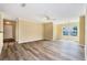 Bright living room with wood floors, neutral walls, and an open layout, perfect for relaxation at 18533 Bridle Club Dr # 18533, Tampa, FL 33647