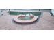 Outdoor pool area featuring a brick paver deck and built-in jacuzzi tub at 1931 Oak Ridge Ct, Clearwater, FL 33759