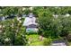 This aerial view highlights the backyard pool and a well maintained community at 1936 Floresta View Dr, Tampa, FL 33618