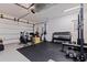 A dedicated workout area inside the spacious garage at 1936 Floresta View Dr, Tampa, FL 33618