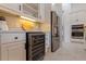 Kitchen with stainless steel appliances including wine fridge at 1936 Floresta View Dr, Tampa, FL 33618