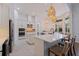 Bright kitchen featuring two islands, white cabinets, and stainless steel appliances at 1936 Floresta View Dr, Tampa, FL 33618