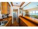 Charming bar area connecting the living room and dining area, perfect for entertaining guests at 1988 Carolina Ne Cir, St Petersburg, FL 33703