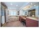 Spacious bathroom featuring a marble encased tub and shower, along with double sink vanities at 1988 Carolina Ne Cir, St Petersburg, FL 33703