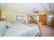 Spacious bedroom with a king-size bed, natural light, and ample closet space at 1988 Carolina Ne Cir, St Petersburg, FL 33703