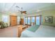 Bright bedroom with ocean view, wood furniture, and ceiling fan at 1988 Carolina Ne Cir, St Petersburg, FL 33703