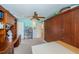 Craft bonus room with craft storage and work areas and neutral carpet at 1988 Carolina Ne Cir, St Petersburg, FL 33703