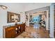 Foyer with tile flooring that flows into a living room with staircase and water view at 1988 Carolina Ne Cir, St Petersburg, FL 33703