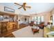 Entertainer's living room with a bar, comfortable seating, an open floor plan, and backyard views at 1988 Carolina Ne Cir, St Petersburg, FL 33703
