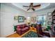 Well-appointed office features custom built-ins, a comfortable reading nook, and ample natural light at 1988 Carolina Ne Cir, St Petersburg, FL 33703