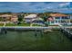 Waterfront home showcasing a private dock for boating, seamlessly blending luxury living with scenic water views at 1988 Carolina Ne Cir, St Petersburg, FL 33703