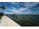 A waterfront shot with a view of a dock at 1988 Carolina Ne Cir, St Petersburg, FL 33703