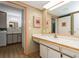 This bathroom features a sink and vanity, with another sink visible in the background at 2035 Nolan Dr, Dunedin, FL 34698