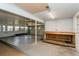 This large garage features lots of windows, overhead lighting and a work bench at 2035 Nolan Dr, Dunedin, FL 34698