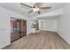 Bright living space with easy access to both a backyard pool and the kitchen at 2063 Ridgecrest Dr, Dunedin, FL 34698