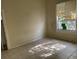 Empty bedroom with large window and tile floors at 2219 Durham St, Tampa, FL 33605