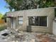 Tan, rectangular one-story building with awning and windows at 2219 Durham St, Tampa, FL 33605