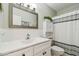 Bathroom featuring a vanity with a large mirror, toilet, and shower at 2261 Swedish Dr # 47, Clearwater, FL 33763